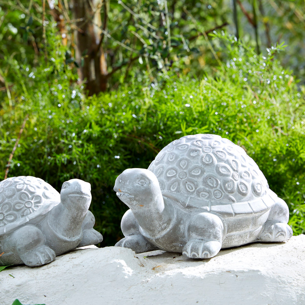 Cement turtle statuette
