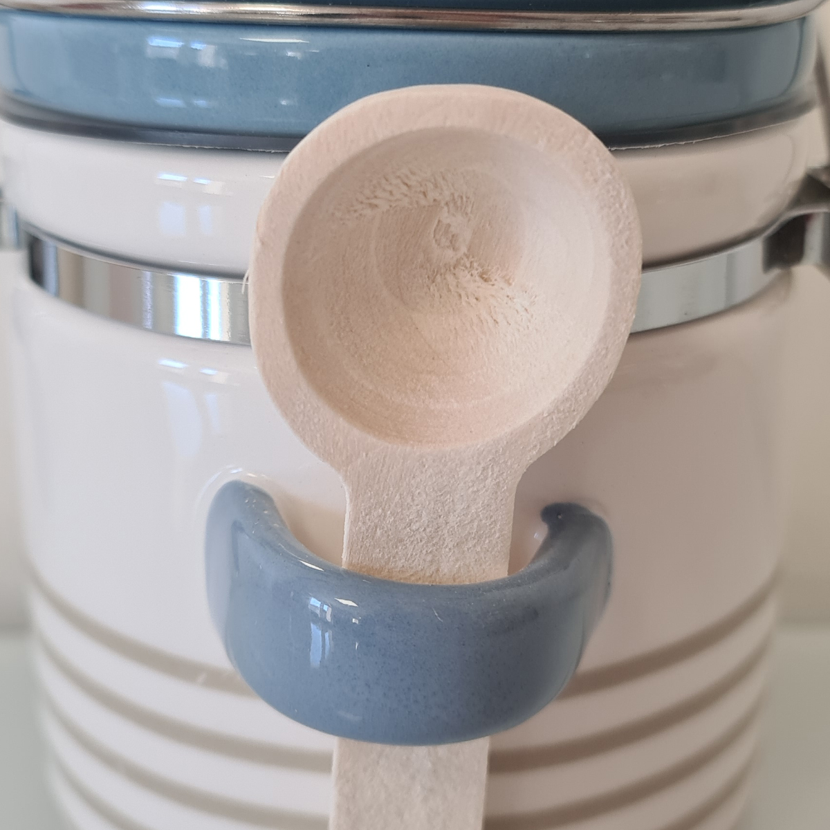Airtight ceramic salt pot with wooden spoon