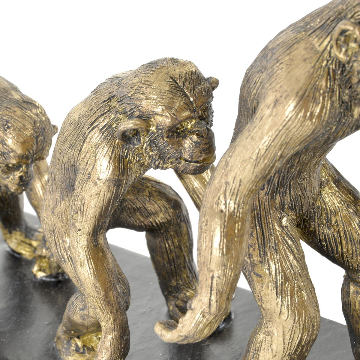 Golden resin figurine - Evolution of man